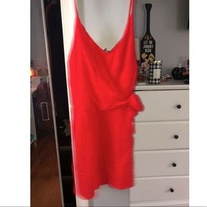 Red romper with tie on hip